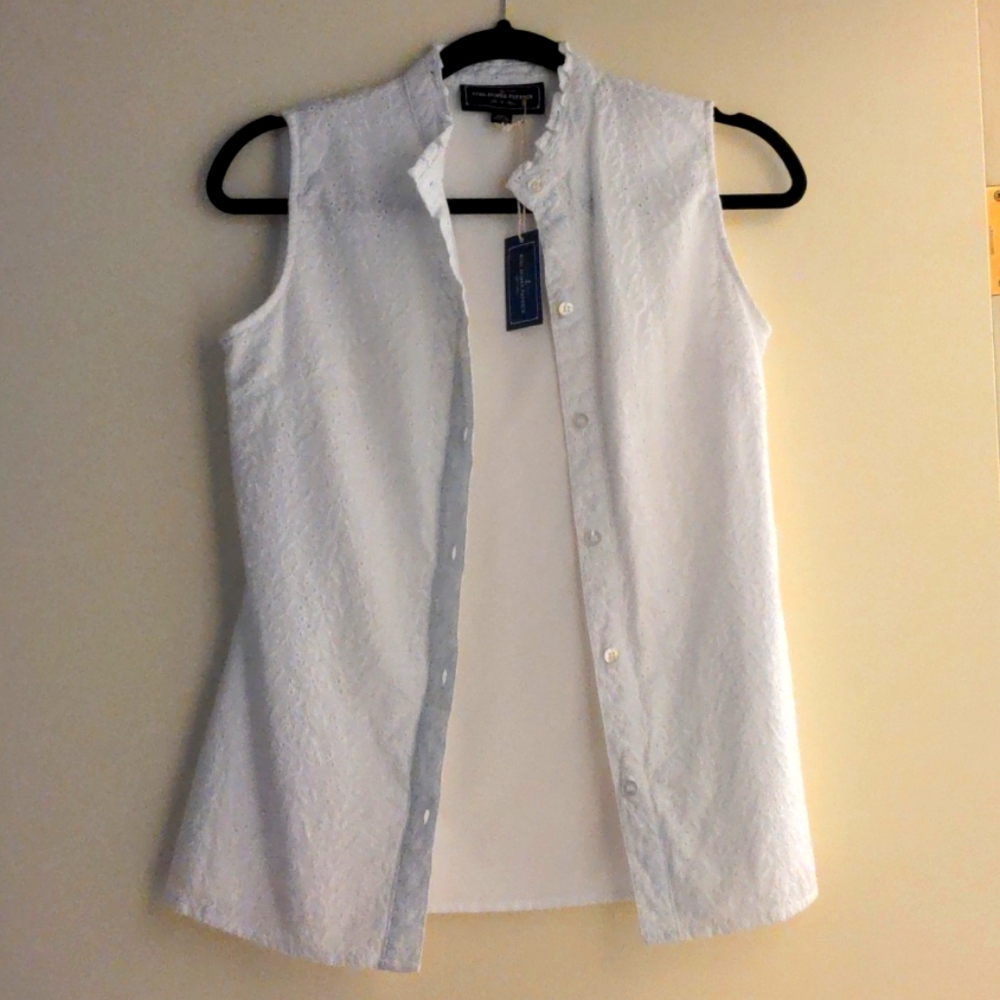 KJP white eyelet sleeveless button down blouse.